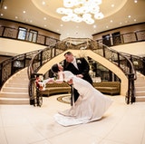 The Main Entrance with Grand Marble Staircase and Waterfall Accents 