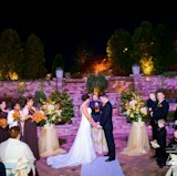 The Majestica Patio set for a night time outdoor Wedding Ceremony